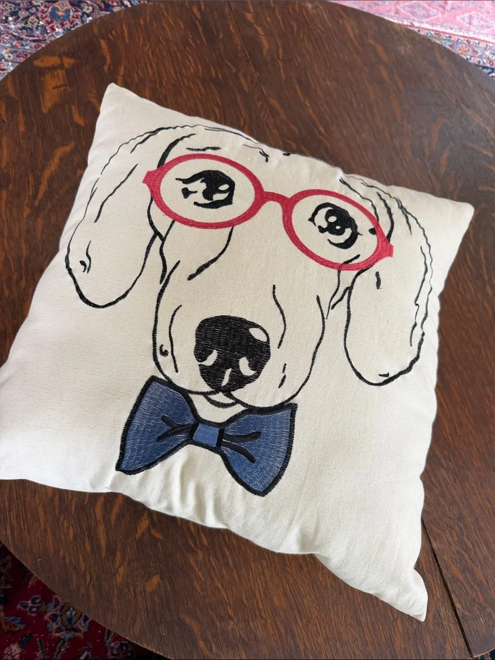 Embroidered Dog Face Throw Pillow with Red Glasses and Blue Bow